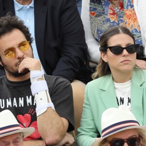 Amir Haddad et son épouse Lital -dans les tribunes des internationaux de France de tennis de Roland-Garros à Paris, France, le 9 juin 2019. © Jacovides-Moreau/Bestimage