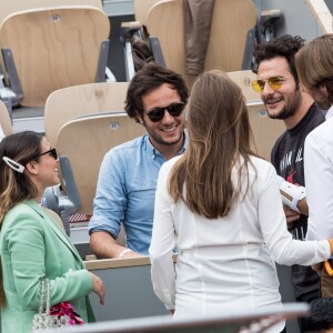 Vianney salué par Amir Haddad et sa femme Lital dans les tribunes lors de la finale messieurs des internationaux de France de tennis de Roland Garros 2019 à Paris le 9 juin 2019. © Jacovides-Moreau/Bestimage  
