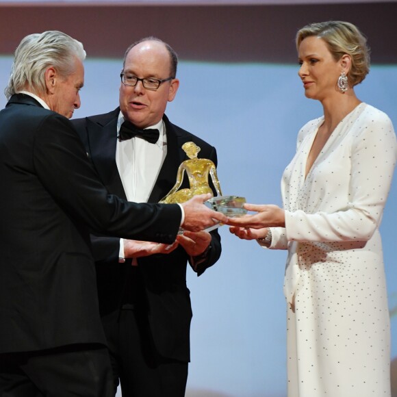 La princesse Charlene (robe Louis Vuitton) et le prince Albert II de Monaco et Michael Douglas lors de la cérémonie de remise des Nymphes d'or du 59e Festival de Télévision de Monte-Carlo au Grimaldi Forum à Monaco le 18 juin 2019. © Bruno Bebert/Bestimage