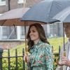 Le prince William, le prince Harry et la duchesse Catherine de Cambridge le 30 août 2017 au Sunken Garden dédié à la mémoire de Lady Diana au palais de Kensington à Londres le 30 août 2017.