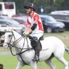 Le prince Harry lors du King Power Royal Charity Polo Day, à cheval. L'équipe du duc de Cambridge est arrivée gagnante. Le 10 juillet 2019.