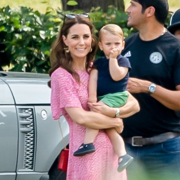 Catherine (Kate) Middleton, duchesse de Cambridge et le prince Louis de Cambridge lors d'un match de polo de bienfaisance King Power Royal Charity Polo Day à Wokinghan, comté de Berkshire, Royaume Uni, le 10 juillet 2019.