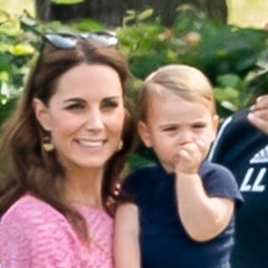 Catherine (Kate) Middleton, duchesse de Cambridge et le prince Louis de Cambridge lors d'un match de polo de bienfaisance King Power Royal Charity Polo Day à Wokinghan, comté de Berkshire, Royaume Uni, le 10 juillet 2019.