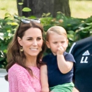 Catherine (Kate) Middleton, duchesse de Cambridge et le prince Louis de Cambridge lors d'un match de polo de bienfaisance King Power Royal Charity Polo Day à Wokinghan, comté de Berkshire, Royaume Uni, le 10 juillet 2019.