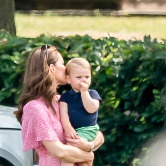 Catherine (Kate) Middleton, duchesse de Cambridge et le prince Louis de Cambridge lors d'un match de polo de bienfaisance King Power Royal Charity Polo Day à Wokinghan, comté de Berkshire, Royaume Uni, le 10 juillet 2019.