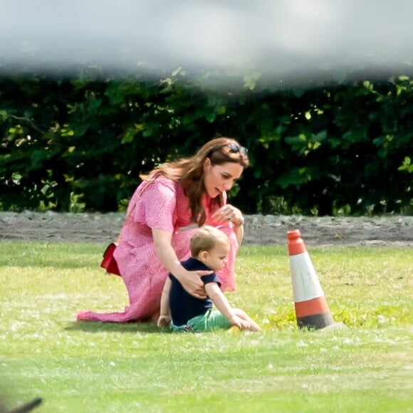 Catherine (Kate) Middleton, duchesse de Cambridge et le prince Louis de Cambridge lors d'un match de polo de bienfaisance King Power Royal Charity Polo Day à Wokinghan, comté de Berkshire, Royaume Uni, le 10 juillet 2019.