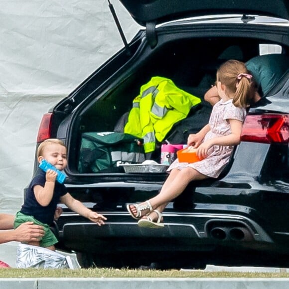 Catherine (Kate) Middleton, duchesse de Cambridge avec ses enfants, le prince George de Cambridge, la princesse Charlotte de Cambridge et le prince Louis de Cambridge lors d'un match de polo de bienfaisance King Power Royal Charity Polo Day à Wokinghan, comté de Berkshire, Royaume Uni, le 10 juillet 2019.