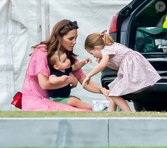 Catherine (Kate) Middleton, duchesse de Cambridge avec ses enfants, la princesse Charlotte de Cambridge et le prince Louis de Cambridge lors d'un match de polo de bienfaisance King Power Royal Charity Polo Day à Wokinghan, comté de Berkshire, Royaume Uni, le 10 juillet 2019.