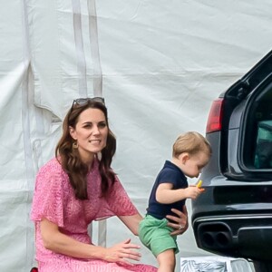 Catherine (Kate) Middleton, duchesse de Cambridge et le prince Louis de Cambridge lors d'un match de polo de bienfaisance King Power Royal Charity Polo Day à Wokinghan, comté de Berkshire, Royaume Uni, le 10 juillet 2019.