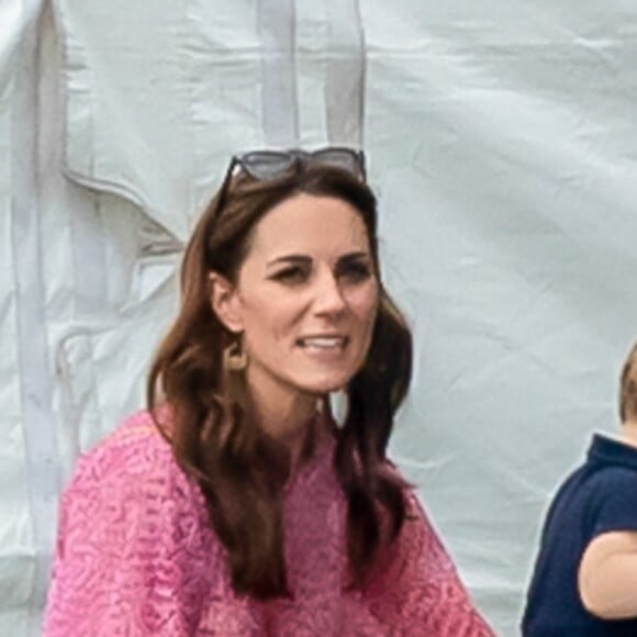 Catherine (Kate) Middleton, duchesse de Cambridge et le prince Louis de Cambridge lors d'un match de polo de bienfaisance King Power Royal Charity Polo Day à Wokinghan, comté de Berkshire, Royaume Uni, le 10 juillet 2019.