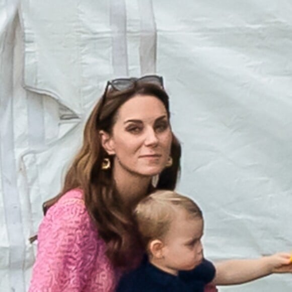 Catherine (Kate) Middleton, duchesse de Cambridge et le prince Louis de Cambridge lors d'un match de polo de bienfaisance King Power Royal Charity Polo Day à Wokinghan, comté de Berkshire, Royaume Uni, le 10 juillet 2019.