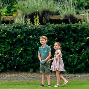 Le prince George de Cambridge et sa soeur la princesse Charlotte de Cambridge lors d'un match de polo de bienfaisance King Power Royal Charity Polo Day à Wokinghan, comté de Berkshire, Royaume Uni, le 10 juillet 2019.