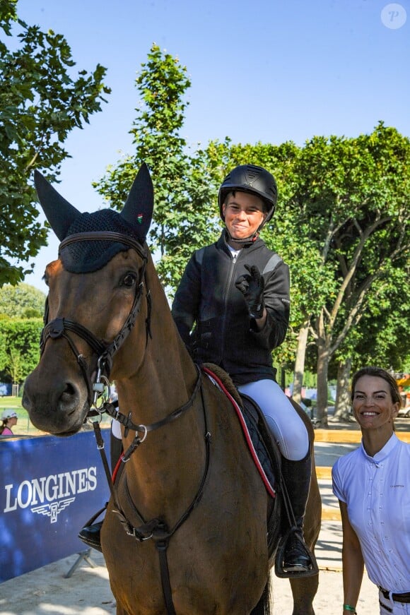 Exclusif - Félicité Herzog pose avec son fils Louis Weinberg Herzog avant le Prix Joone lors du Longines Paris Eiffel Jumping au Champ de Mars à Paris, France, le 6 juillet 2019. © Pierre Perusseau/Bestimage  Exclusive - For Germany please call for price - No web en Suisse / Belgique Longines Paris Eiffel Jumping at the Champ de Mars in Paris, France, on July 6th, 2019.06/07/2019 - Paris