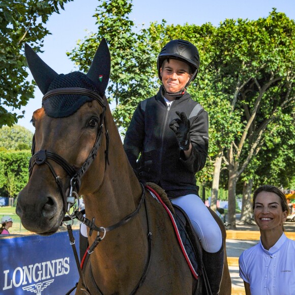Exclusif - Félicité Herzog pose avec son fils Louis Weinberg Herzog avant le Prix Joone lors du Longines Paris Eiffel Jumping au Champ de Mars à Paris, France, le 6 juillet 2019. © Pierre Perusseau/Bestimage  Exclusive - For Germany please call for price - No web en Suisse / Belgique Longines Paris Eiffel Jumping at the Champ de Mars in Paris, France, on July 6th, 2019.06/07/2019 - Paris