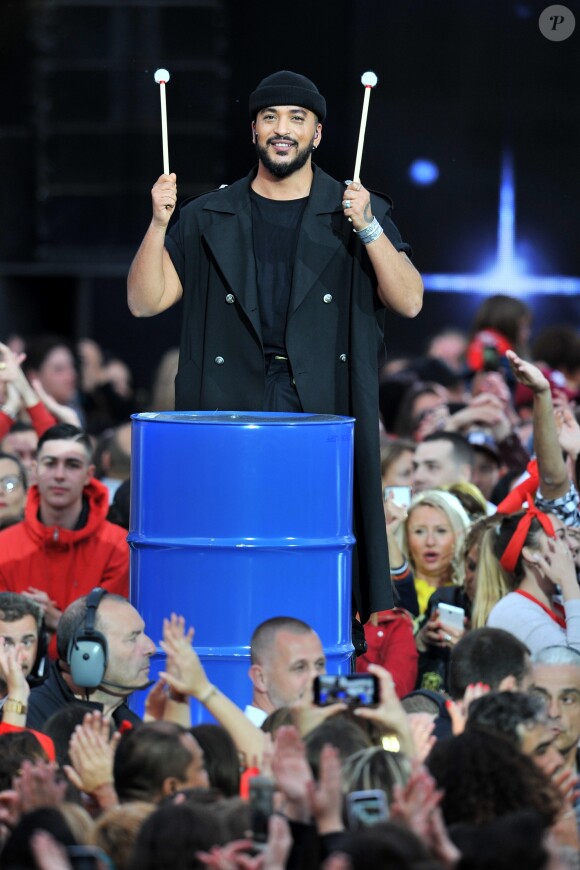 Slimane lors de l'enregistrement de l'émission "La Chanson de l'Année 2019" aux Arènes de Nîmes, le 16 mai 2019. L'émission sera diffusée sur TF1 le samedi 15 juin. TF1 propose aux téléspectateurs une soirée exceptionnelle avec "La Chanson de l'Année" présentée par N.Aliagas et produite par DMLS TV. Les téléspectateurs pourront élire en direct "La Chanson de l'Année" parmi les 20 titres en compétition. Les votes débuteront dès 21 h et le prix sera annoncé en fin d'émission. Un prix d'honneur sera également remis au cours de la soirée à un artiste emblématique de la chanson française. " La Chanson de l'Année" sera diffusée depuis un lieu mythique, les Arènes de Nîmes. Un grand show musical en présence de tous les artistes qui ont marqué l'année. Ces stars de la chanson française et internationales interpréteront leurs titres et formeront des duos totalement inédits. © Guillaume Gaffiot/Bestimage