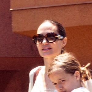 Exclusif - Angelina Jolie sort du magasin animalier PetSmart à Los Angeles accompagnée de sa fille Vivienne qui porte un petit lapin dans les bras. La petite Vivienne très souriante semble enchantée d'avoir adopté ce nouveau compagnon! Le 17 juillet 2019  For germany call for price - Please hide children face prior publication Exclusive - Angelina Jolie and daughter Vivienne are bright-smiled as they leave PetSmart with a new pet! It looks like a bunny is the reason for Vivienne's and her mother's big smiles! Angelina walks with her daughter back to their ride as Vivienne upholds the responsibility of taking the bunny home in her arms. 17th july 201917/07/2019 - Los Angeles