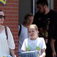 Exclusif - Angelina Jolie sort du magasin animalier PetSmart à Los Angeles accompagnée de sa fille Vivienne qui porte un petit lapin dans les bras. La petite Vivienne très souriante semble enchantée d'avoir adopté ce nouveau compagnon! Le 17 juillet 2019  For germany call for price - Please hide children face prior publication Exclusive - Angelina Jolie and daughter Vivienne are bright-smiled as they leave PetSmart with a new pet! It looks like a bunny is the reason for Vivienne's and her mother's big smiles! Angelina walks with her daughter back to their ride as Vivienne upholds the responsibility of taking the bunny home in her arms. 17th july 201917/07/2019 - Los Angeles