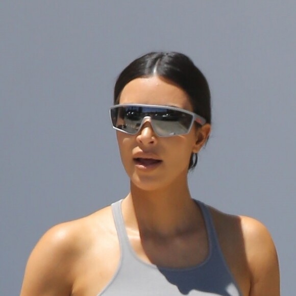 Exclusif - Kim Kardashian et son mari Kanye West à la sortie de la messe Sunday Service de Kanye West à Los Angeles, le 14 juillet 2019.