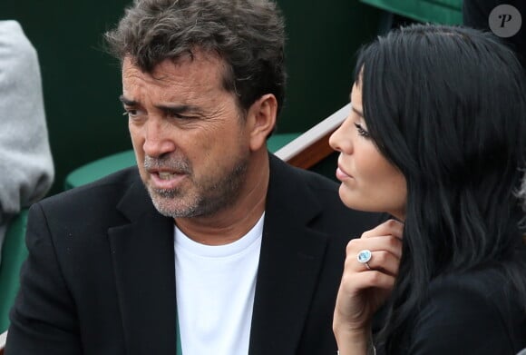 Arnaud Lagardère et sa femme Jade Foret - People aux Internationaux de France de tennis de Roland Garros à Paris, le 29 mai 2014.