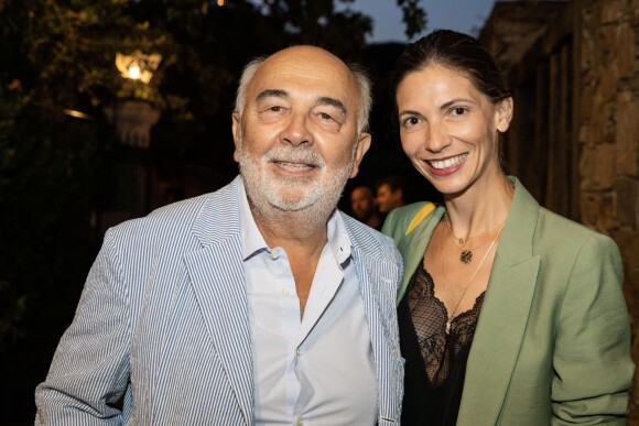 Exclusif - Gérard Jugnot et sa compagne Patricia Campi lors du Festival de Ramatuelle, France, le 5 août 2019.