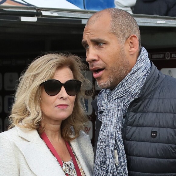 Valérie Trierweiler et Romain Magellan, au "Match des Légendes" durant lequel de grands noms du football et du rugby se sont affrontés pour une mi-temps de foot et une autre de rugby au profit de l'association "Un sourire, un espoir pour la vie" au stade Chaban Delmas, à Bordeaux, France, le 27 Mai 2019.