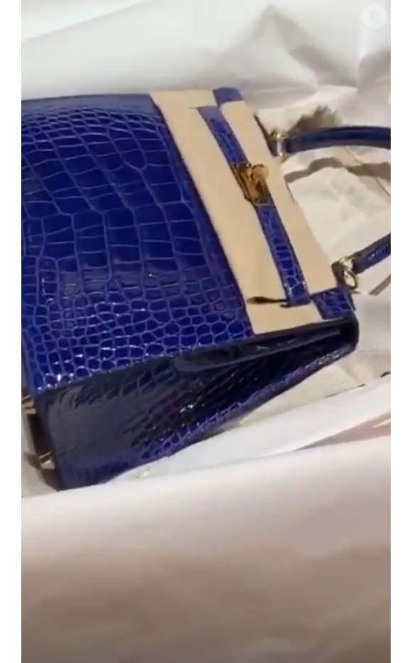 Nabilla et Thomas Vergara lors d'une virée shopping chez Hermès à Madrid, en Espagne, le 21 août 2019.