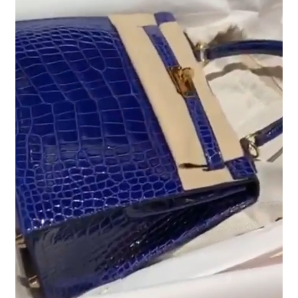 Nabilla et Thomas Vergara lors d'une virée shopping chez Hermès à Madrid, en Espagne, le 21 août 2019.
