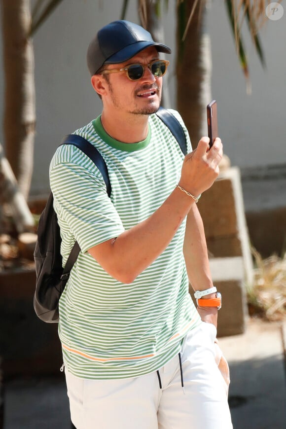 Orlando Bloom est en vacances avec des amis à Ibiza, 26 juillet 2019.