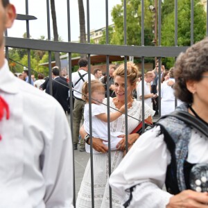 Laura Tenoudji, la femme de Christian Estrosi, et leur fille Bianca, lors de "Lou Festin Nissart", le grand banquet populaire organisé dans le jardin Albert 1er à Nice par l'association des Amis du Maire, le 30 août 2019. © Bruno Bebert / Bestimage