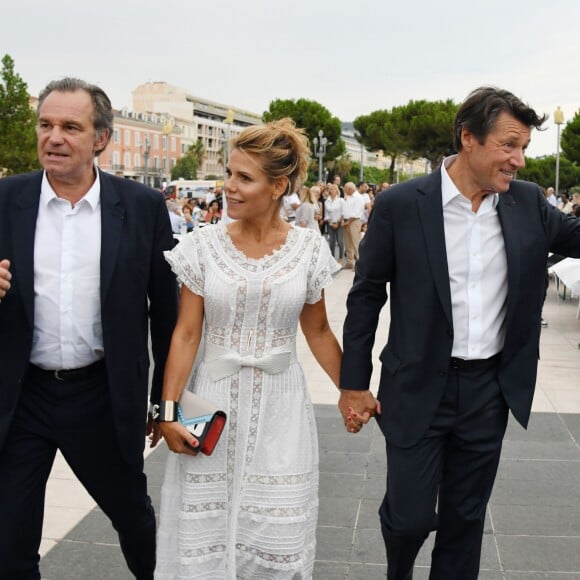 Christian Estrosi et sa femme Laura Tenoudji avec Renaud Muselier, président du conseil régional de la Région Sud, lors de "Lou Festin Nissart", le grand banquet populaire organisé dans le jardin Albert 1er à Nice par l'association des Amis du Maire, le 30 août 2019. © Bruno Bebert / Bestimage