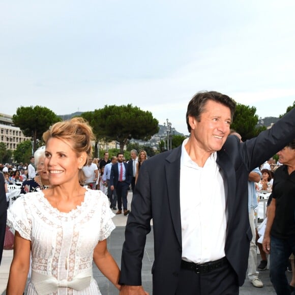 Christian Estrosi et sa femme Laura Tenoudji avec Renaud Muselier, président du conseil régional de la Région Sud, lors de "Lou Festin Nissart", le grand banquet populaire organisé dans le jardin Albert 1er à Nice par l'association des Amis du Maire, le 30 août 2019. © Bruno Bebert / Bestimage