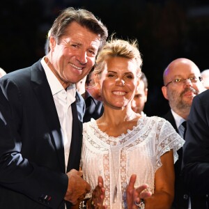 Christian Estrosi et son épouse Laura Tenoudji sur la scène lors de "Lou Festin Nissart", le grand banquet populaire organisé dans le jardin Albert 1er à Nice par l'association des Amis du Maire, le 30 août 2019. © Bruno Bebert / Bestimage