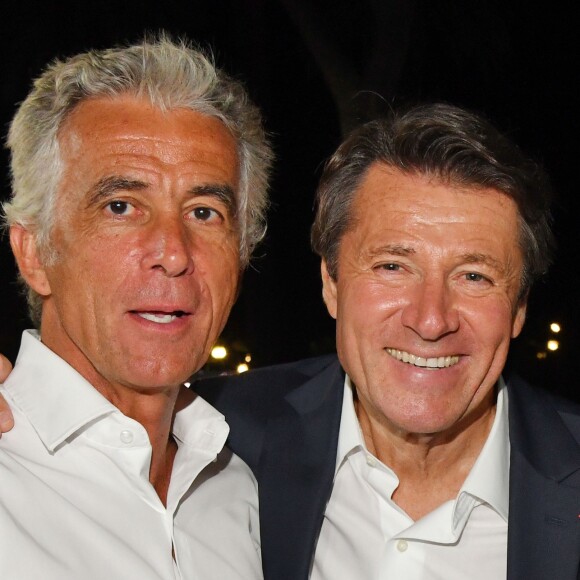 Jean-Pierre Rivère, président de l'OGC Nice, et Christian Estrosi lors de "Lou Festin Nissart", le grand banquet populaire organisé dans le jardin Albert 1er à Nice par l'association des Amis du Maire, le 30 août 2019. © Bruno Bebert / Bestimage