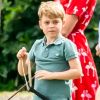 Le prince George de Cambridge et sa soeur la princesse Charlotte de Cambridge lors d'un match de polo disputé par le prince William à Wokinghan dans le Berkshire le 10 juillet 2019.