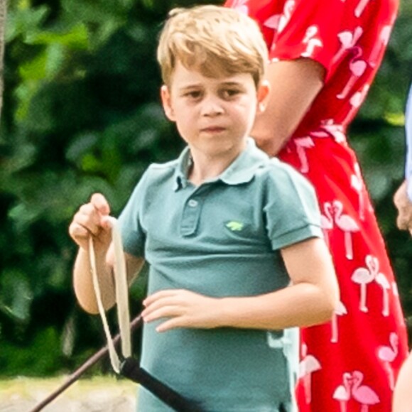Le prince George de Cambridge et sa soeur la princesse Charlotte de Cambridge lors d'un match de polo disputé par le prince William à Wokinghan dans le Berkshire le 10 juillet 2019.