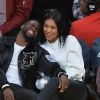 Kevin Hart avec sa femme Eniko Parrish - Les célébrités assistent au match de basket des Lakers à Los Angeles, le 19 décembre 2017.