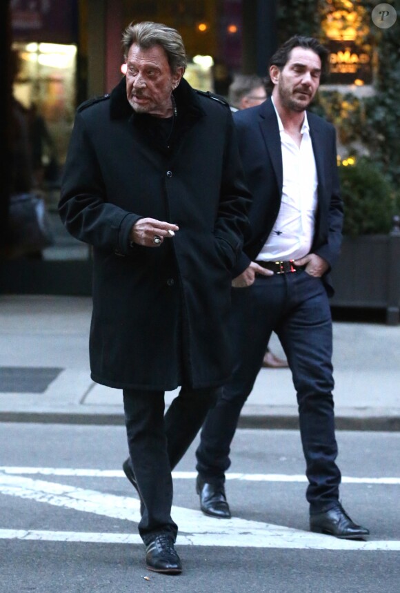 Exclusif - Johnny Hallyday et Sébastien Farran à New York, le 19 mars 2015, lors des 40 ans de Laeticia.