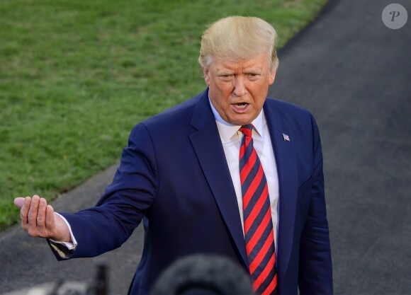 Donald Trump en conférence de presse dans les jardins de la Maison Blanche à Washington, avant de monter dans l'hélicopère Marine One pour se rendre à Baltimore pour un dîner. Le 12 septembre 2019