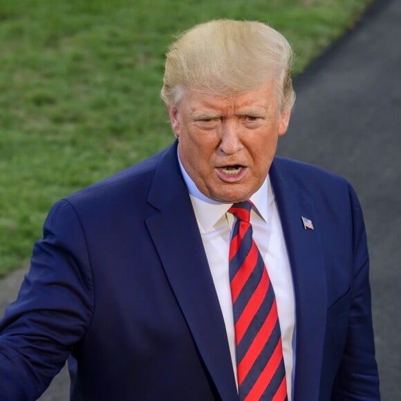 Donald Trump en conférence de presse dans les jardins de la Maison Blanche à Washington, avant de monter dans l'hélicopère Marine One pour se rendre à Baltimore pour un dîner. Le 12 septembre 2019