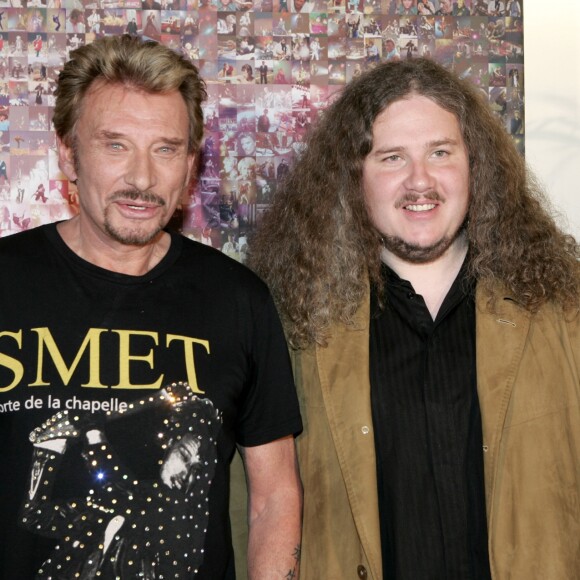 Jean-Claude Camus, Johnny Hallyday et Yvan Cassar - Johnny Hallyda donne une conférence de presse pour sa tournée "Flashbak Tour" dans le salon d'honneur de Paris Bercy le 31 mai 2006.