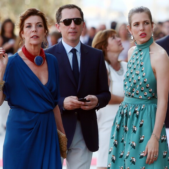 La princesse Caroline de Hanovre, Gad Elmaleh et sa compagne Charlotte Casiraghi arrivant à la soirée pour l'inauguration du nouveau Yacht Club de Monaco, Port Hercule, le 20 juin 2014.