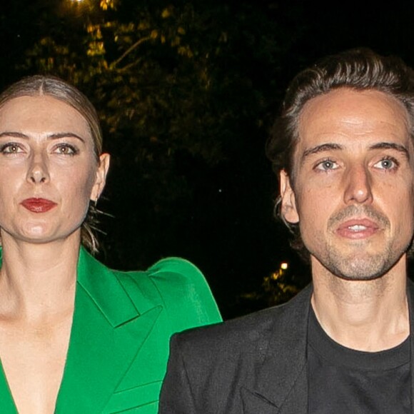 Maria Sharapova et Alexander Gilkes au défilé Givenchy collection prêt-à-porter printemps/été 2020 lors de la Fashion Week de Paris (PFW), le 29 septembre 2019.