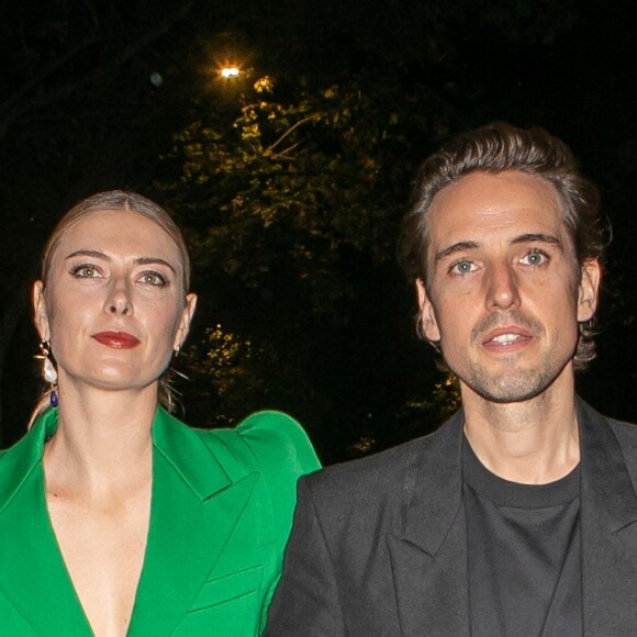 Maria Sharapova et Alexander Gilkes au défilé Givenchy collection prêt-à-porter printemps/été 2020 lors de la Fashion Week de Paris (PFW), le 29 septembre 2019.