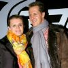 Exclusif - Michael Schumacher et sa femme Corinna à la boîte de nuit "La Suite", à Paris, le 5 décembre 2004.