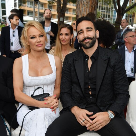 Pamela Anderson et Adil Rami lors de la soirée Amber Lounge Monaco 2019 au profit de la fondation de Jackie Stewart "Race Against Dementia" à l'hôtel Méridien Beach Plaza à Monaco, le 24 mai 2019. © Bruno Bebert / Bestimage