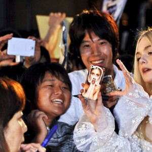 Elle Fanning assiste à la première du film "Maleficent" à Tokyo. Le 23 juin 2014.