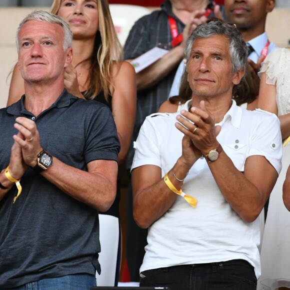 Didier Deschamps, Nagui, Cyril Rool, sa femme au second rang Mélanie Page, à gauche, et des amis durant le Match de football de Ligue 1 opposant Monaco à Lille au stade Louis II le 18 août 2018. Pour leur première rencontre à domicile de la saison 2018/2019, les monégasques n'ont obtenu qu'un match nul 0 - 0. © Bruno Bebert/Bestimage