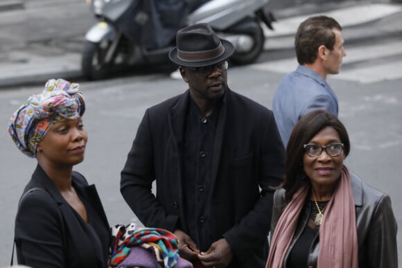 Lilian Thuram et sa compagne Kareen Guiock - Obsèques de l'acteur Jean-Michel Martial en l'église Saint-Roch à Paris le 23 octobre 2019. © Christophe Clovis/Bestimage