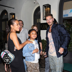 Christina Milian, enceinte, son compagnon Matt Pokora et sa fille Violet Madison sont allés dîner dans le restaurant Madeo à Beverly Hills, le 8 août 2019.