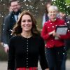 Le prince William, Kate Middleton et sa secrétaire privée Catherine Quinn arrivent une fête de Noël pour le personnel de la RAF (Royal Air Force) Coningsby et Marham à Londres le 4 décembre 2018.